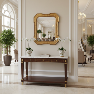 Specchio con cornice in legno intagliata e decorata in foglia oro